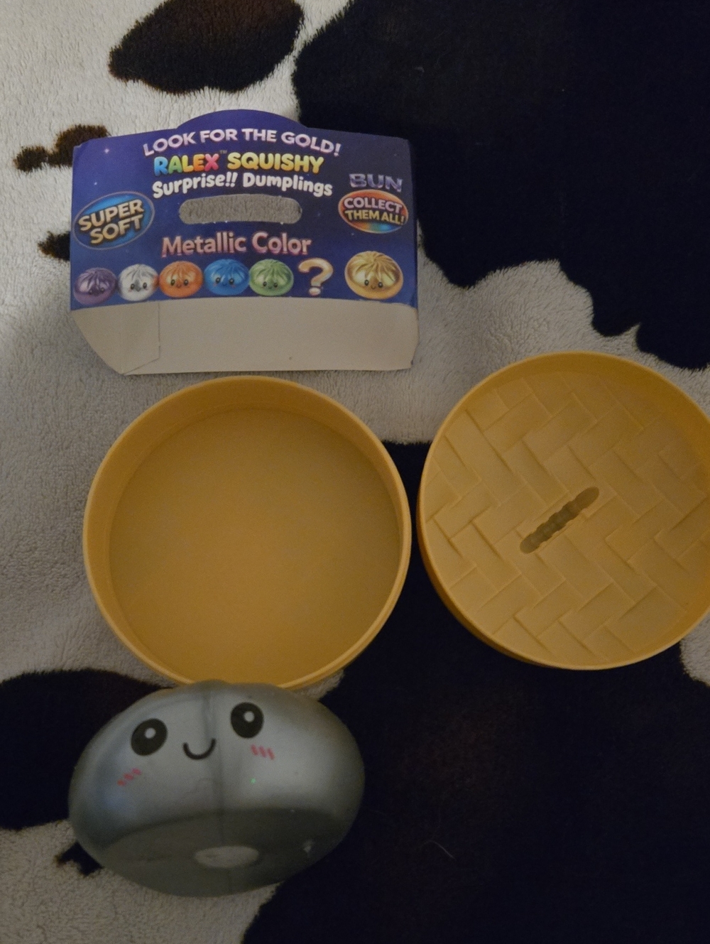 Metallic Gray Squishy Dumpling with Yellow Case